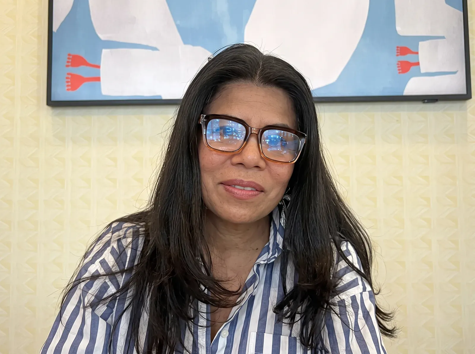 Monica, the Enso interior designer, on camera