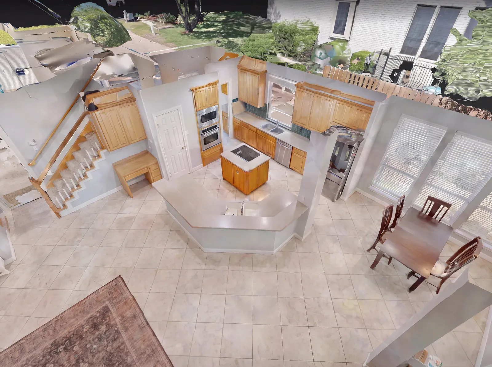 Overhead cutaway scan of an existing kitchen, dining room, and staircase