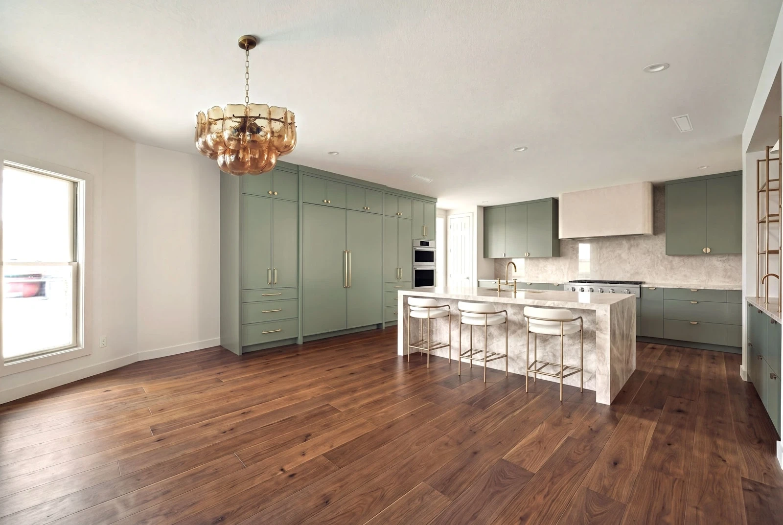After: the Westlake Hills kitchen with a sage island and Taj Mahal quartzite